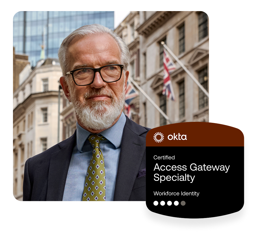 Older man with glasses and a grey beard wearing a suit, next to an Okta Certified Access Gateway Specialty badge.